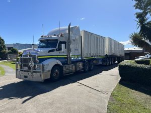 Shipping Containers Safely carried by a truck
